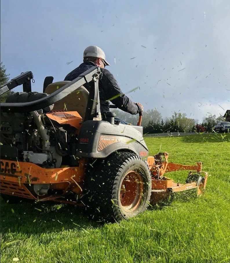 R&R lawn mowing service in progress