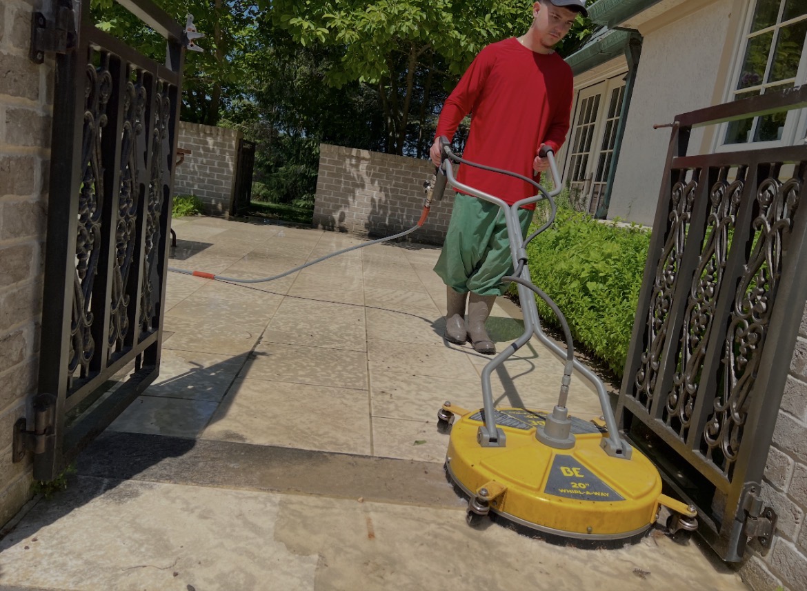 R&R power washing with a yellow surface cleaner